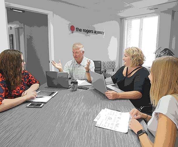 Rogers Agency around table | Full-Service Advertising Agency