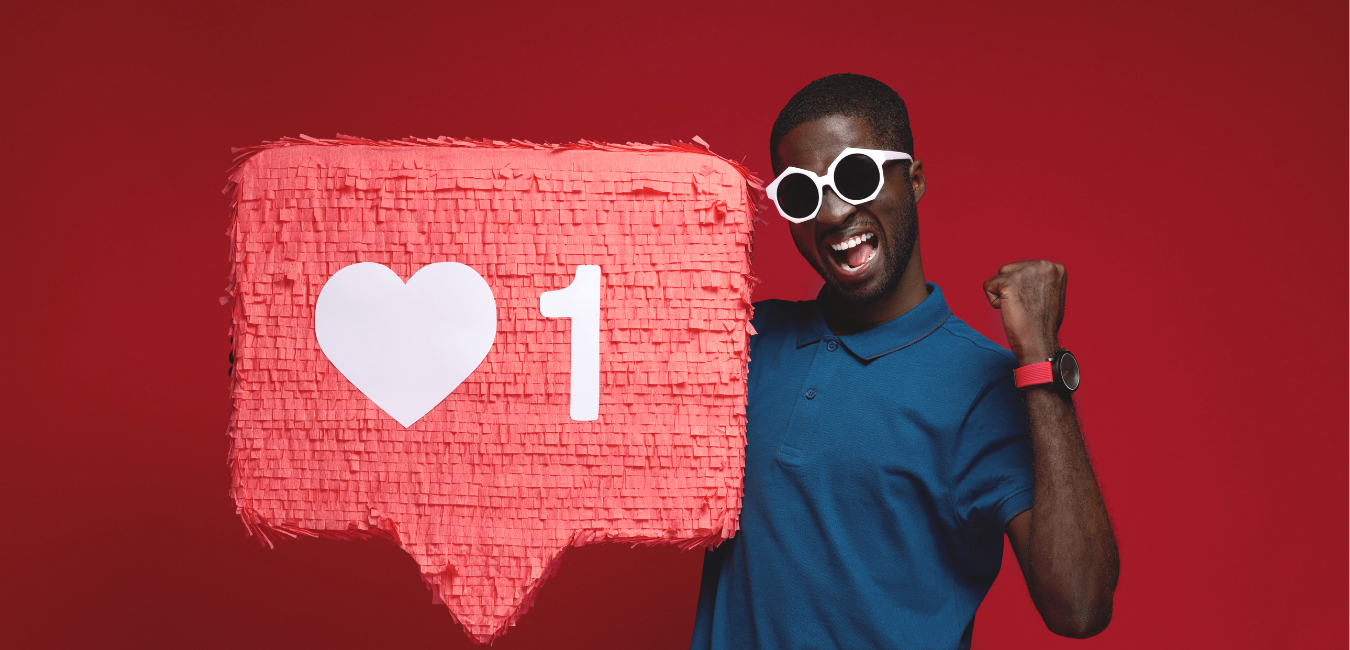 Happy man with social media like icon on red background
