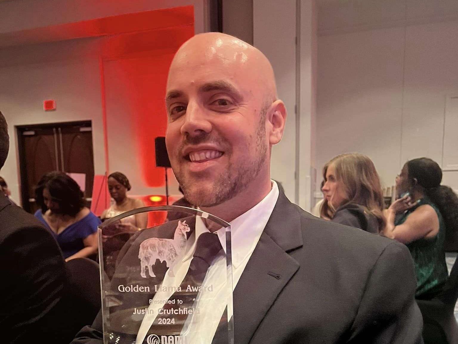 Justin Crutchfield receives award at NAMI Mental Health Hero Ball
