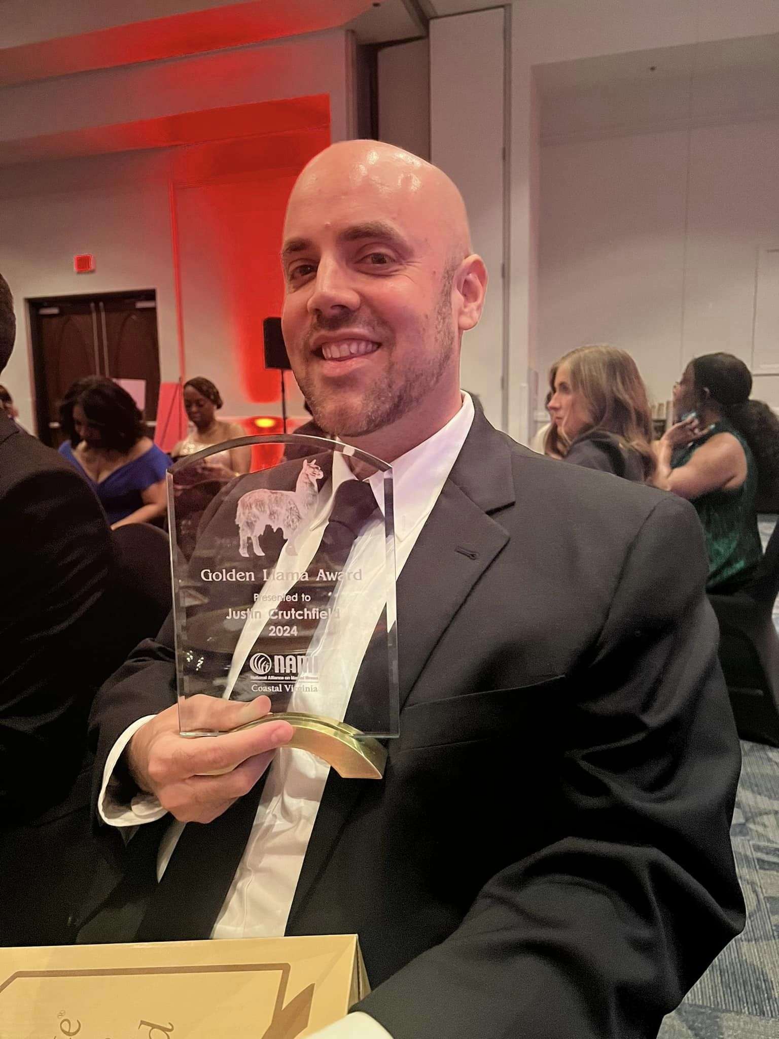Justin Crutchfield receives award at NAMI Mental Health Hero Ball